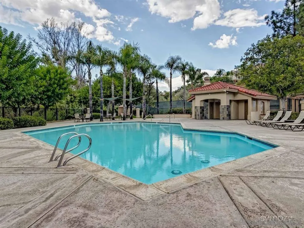 1988 Monarch Ridge Circle El Cajon, CA 92019 - Photo 26 of 27 a swimming pool with outdoor seating and yard