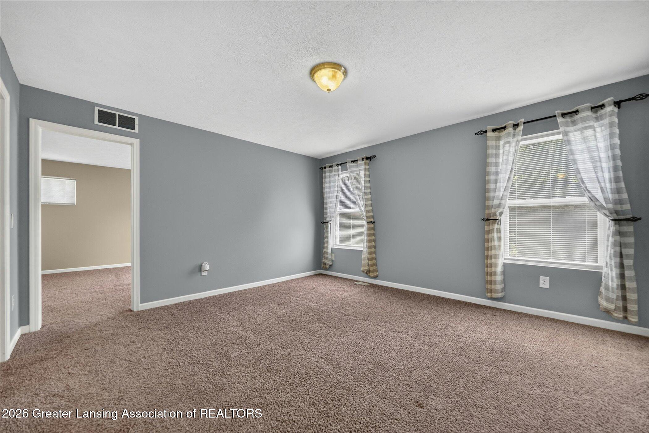 47 Lake Ridge Drive Mason, MI 48854 - Photo 24 of 53 25-47-Lake-Ridge-Dr-Windowstill