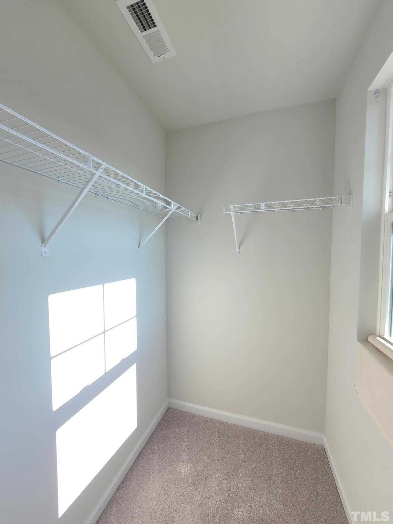 1038 Shoreside Drive Durham, NC 27713 - Photo 27 of 42 a view of an empty room with a window