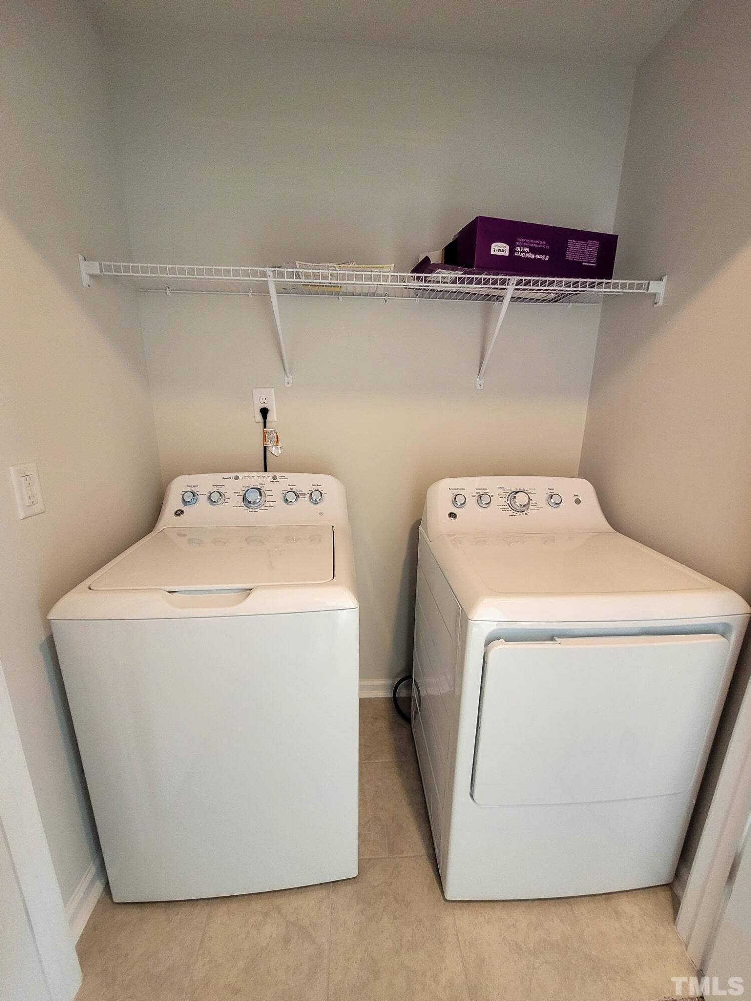 1038 Shoreside Drive Durham, NC 27713 - Photo 31 of 42 a utility room with dryer and washer