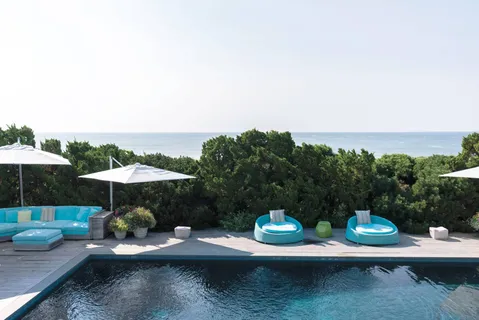 a view of backyard with seating space