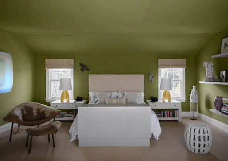 a living room with a couch and a table chair