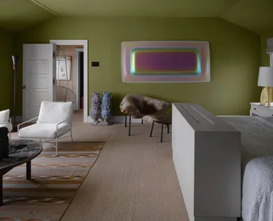a living room with furniture and a rug