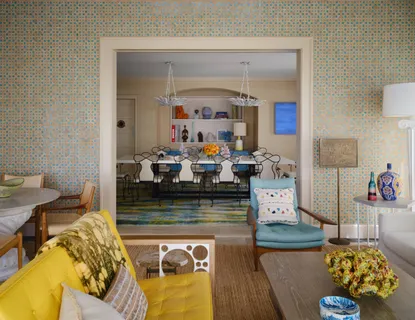 a living room with furniture and a table