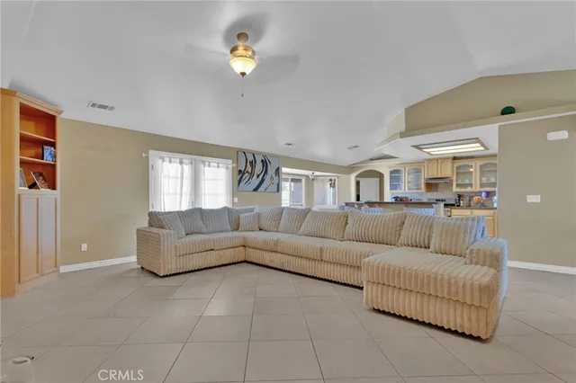 a living room with furniture and a couch