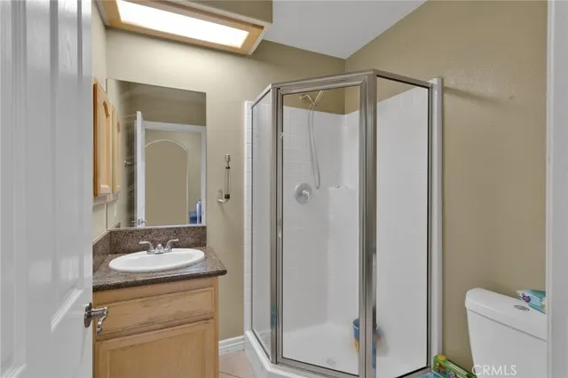 a living room with a bed furniture and a window