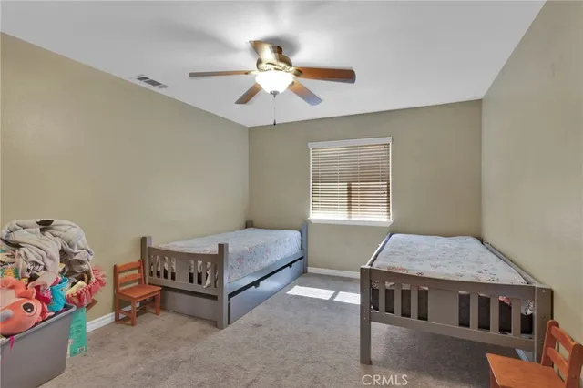 a living room with toys and a couch