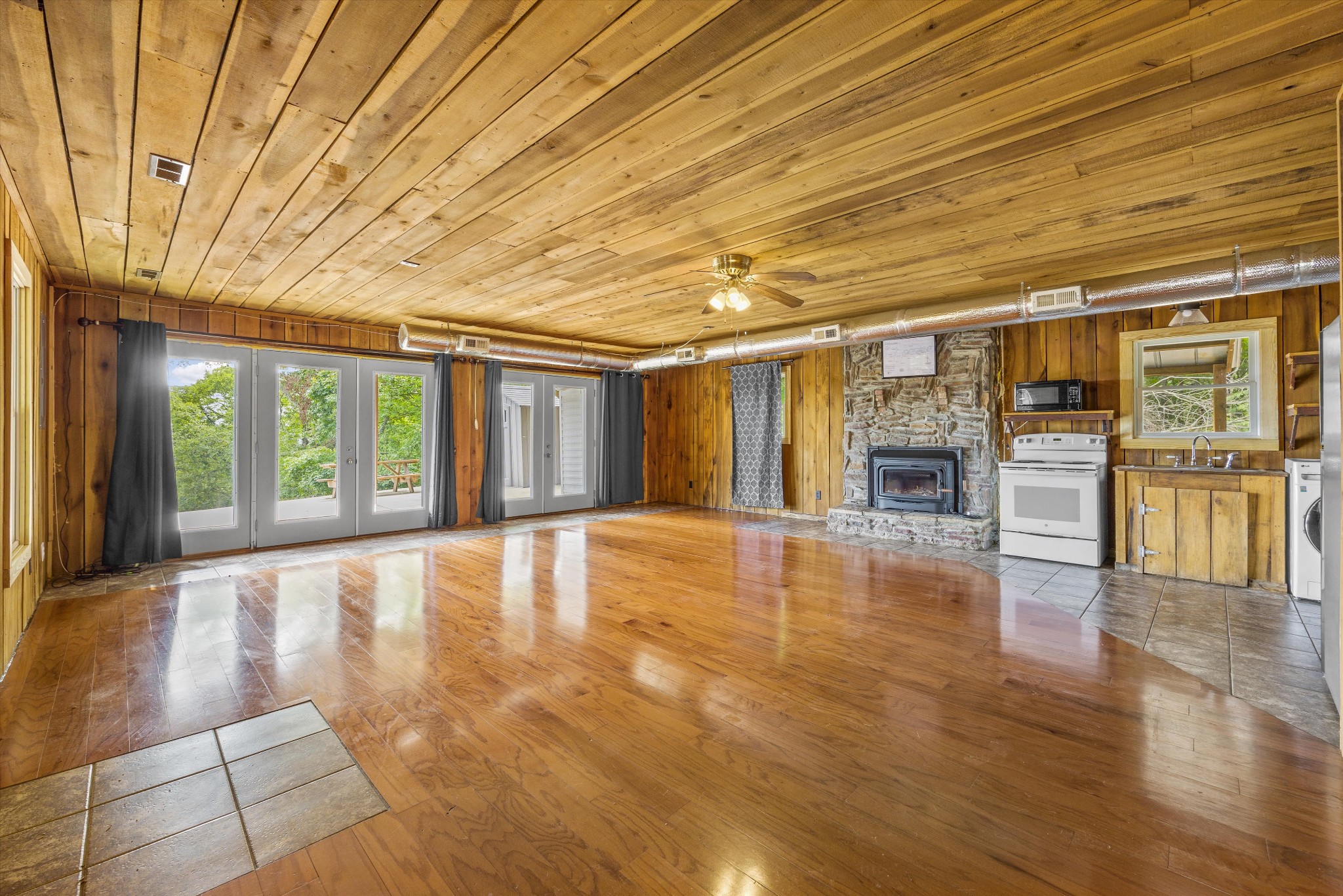 195 Curtis Road Fayetteville, TN 37334 - Photo 11 of 45 a view of an empty room with kitchen and a window