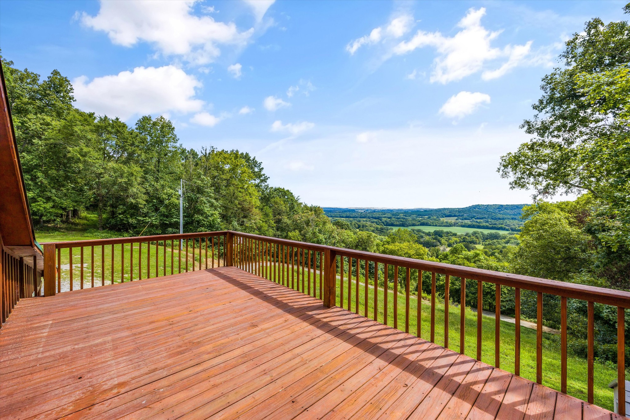 195 Curtis Road Fayetteville, TN 37334 - Photo 16 of 45 a view of balcony with wooden floor and fence