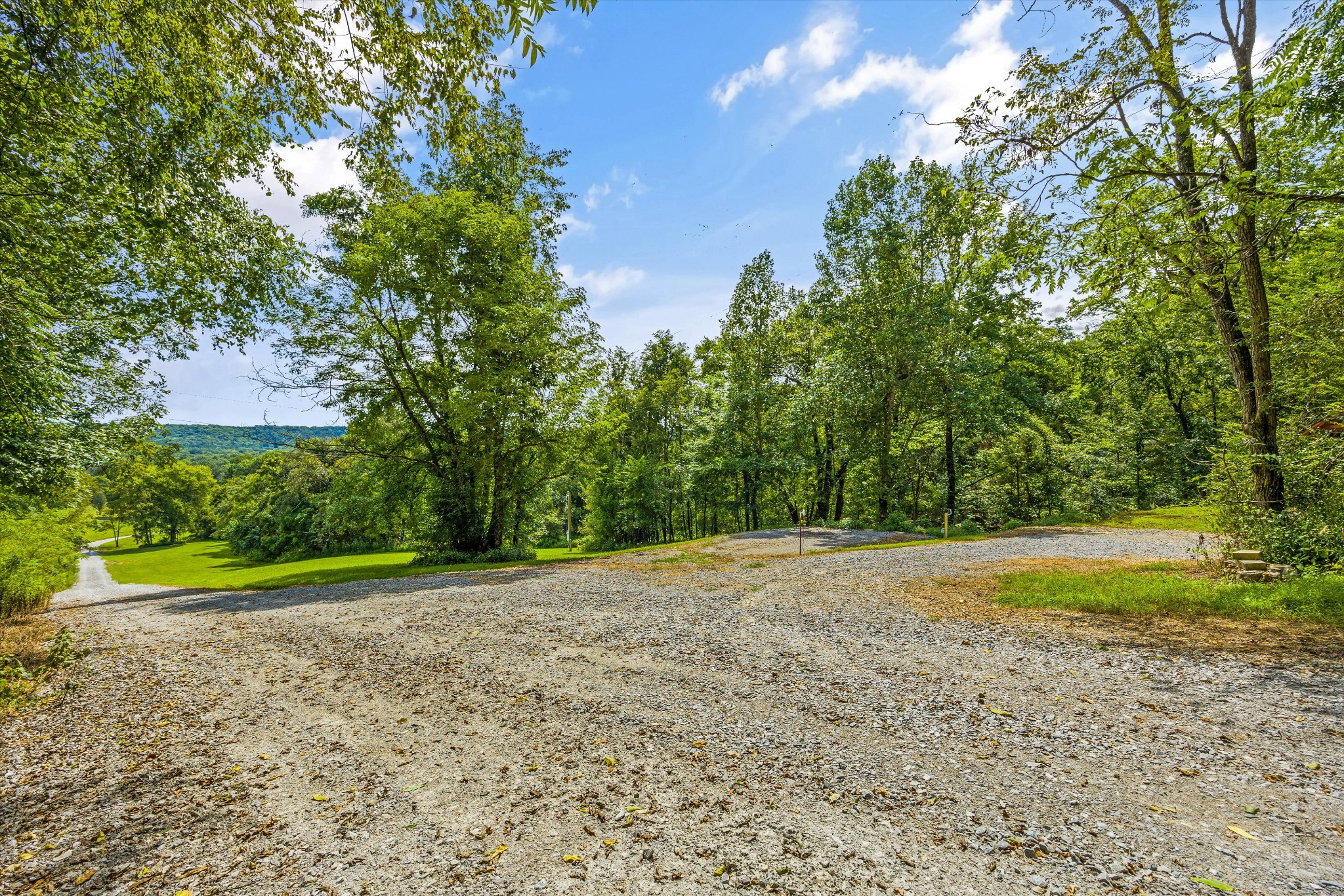 195 Curtis Road Fayetteville, TN 37334 - Photo 23 of 45 a view of a field with large trees