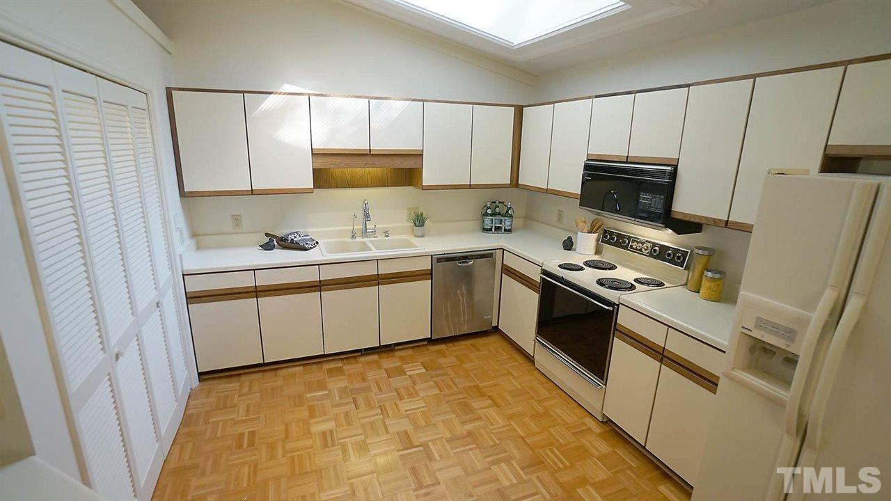 2801 Rue Sans Famille Raleigh, NC 27607 - Photo 10 of 26 Washer/dryer convenient location in kitchen