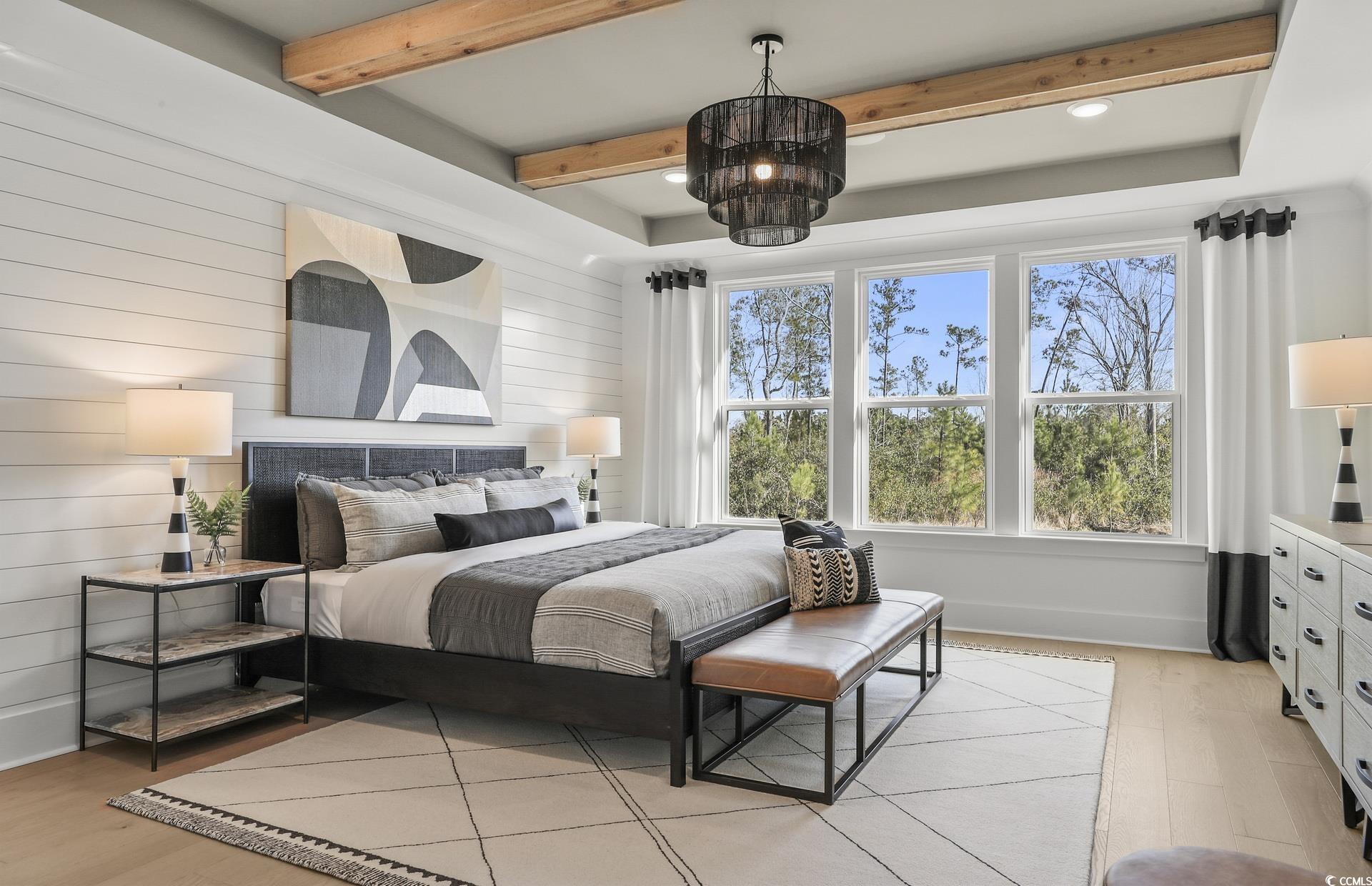 1514 Winding Crk Way Myrtle Beach, SC 29588 - Photo 10 of 20 Bedroom with beamed ceiling, wooden walls, and light wood-style flooring