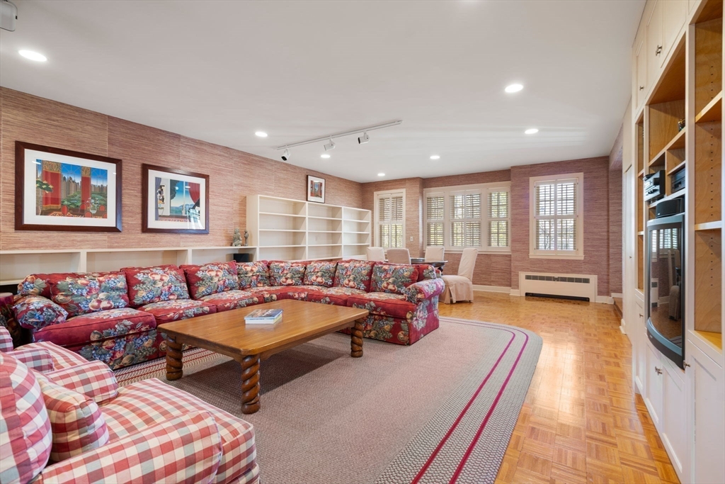 41 Nobscot Road Newton, MA 02459 - Photo 15 of 37 a living room with furniture a rug and a large window
