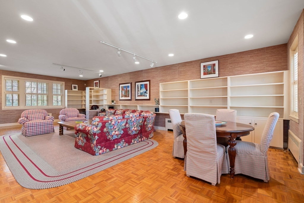 41 Nobscot Road Newton, MA 02459 - Photo 17 of 37 a living room with furniture and a flat screen tv