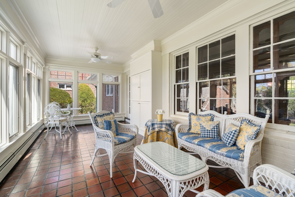 41 Nobscot Road Newton, MA 02459 - Photo 19 of 37 a living room with furniture a large window and dining table