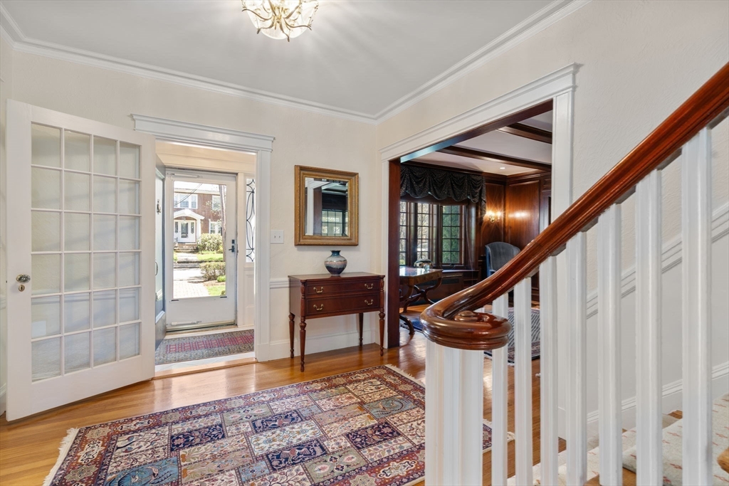 41 Nobscot Road Newton, MA 02459 - Photo 21 of 37 a view of an entryway with wooden floor and a livingroom view