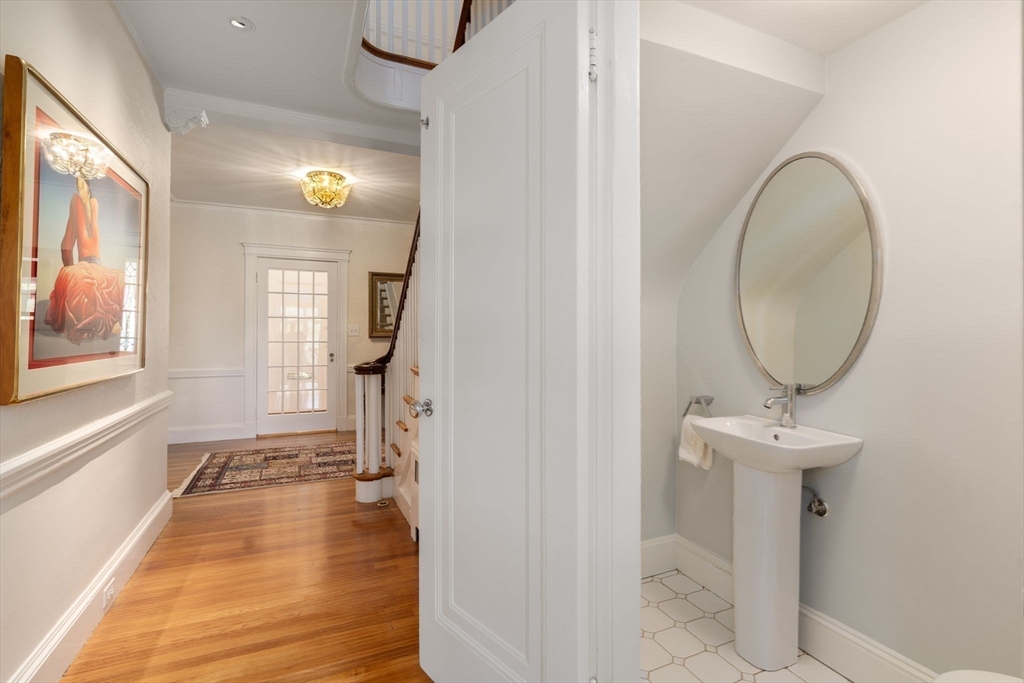 41 Nobscot Road Newton, MA 02459 - Photo 22 of 37 a bathroom with a sink and a mirror