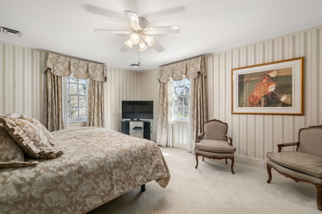 41 Nobscot Road Newton, MA 02459 - Photo 25 of 37 a bedroom with a bed and a couch