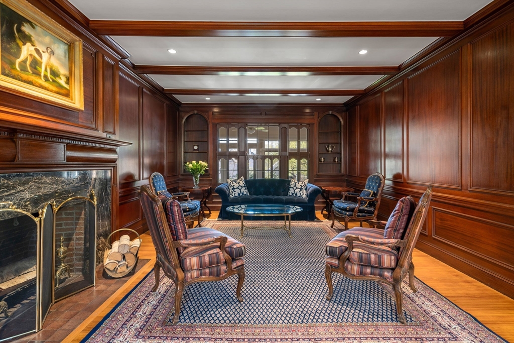 41 Nobscot Road Newton, MA 02459 - Photo 3 of 37 a living room with furniture and a fireplace