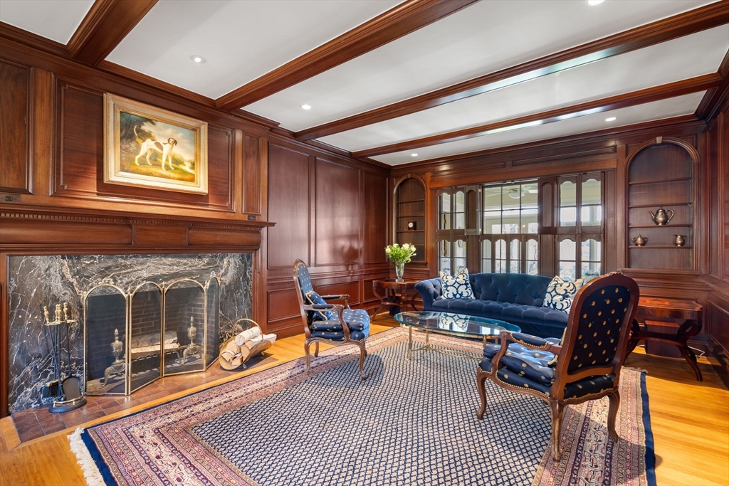 41 Nobscot Road Newton, MA 02459 - Photo 4 of 37 a living room with furniture a fireplace and a table