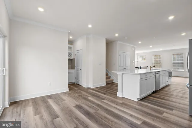 a view of kitchen with wooden floor
