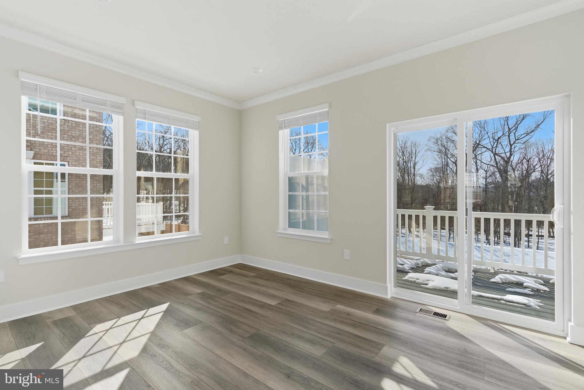 1722 Water Xing Road Baltimore, MD 21208 - Photo 13 of 41 a view of an empty room with a window