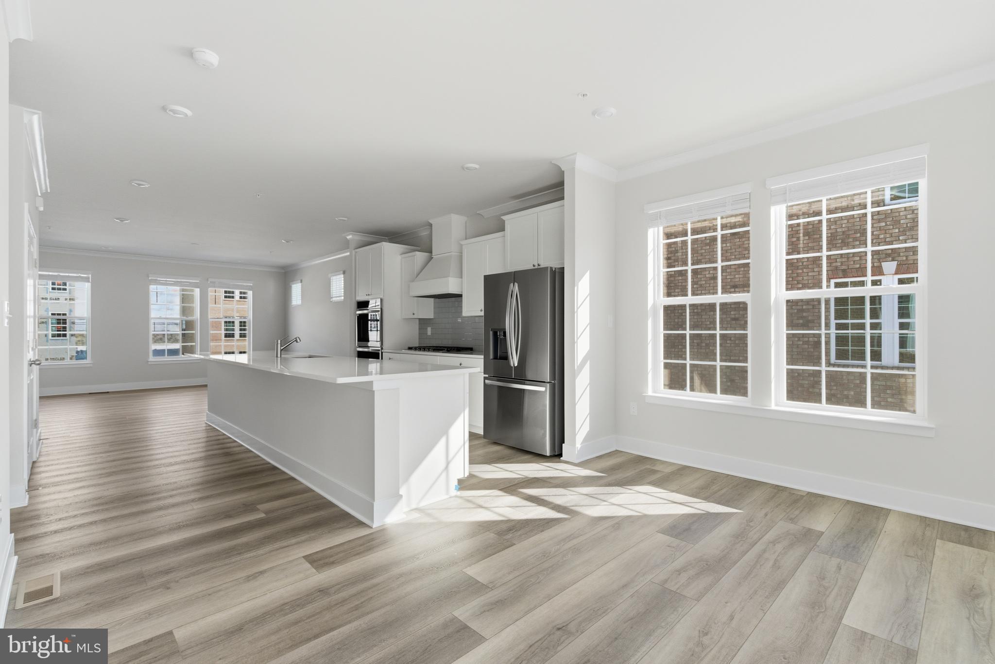 1722 Water Xing Road Baltimore, MD 21208 - Photo 14 of 41 a view of a kitchen with windows