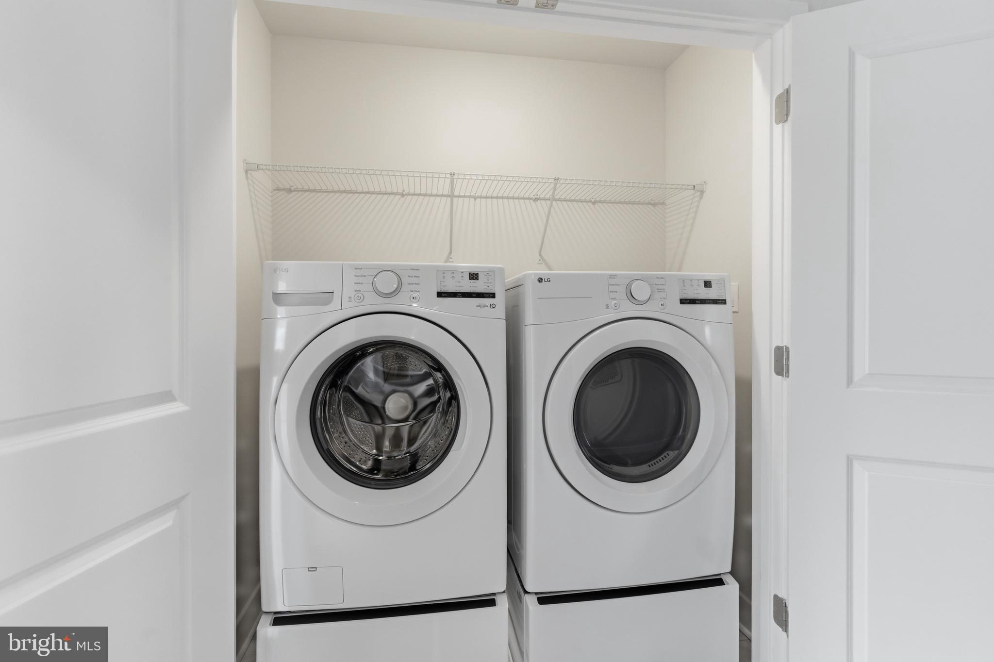 1722 Water Xing Road Baltimore, MD 21208 - Photo 18 of 41 a utility room with dryer and washer