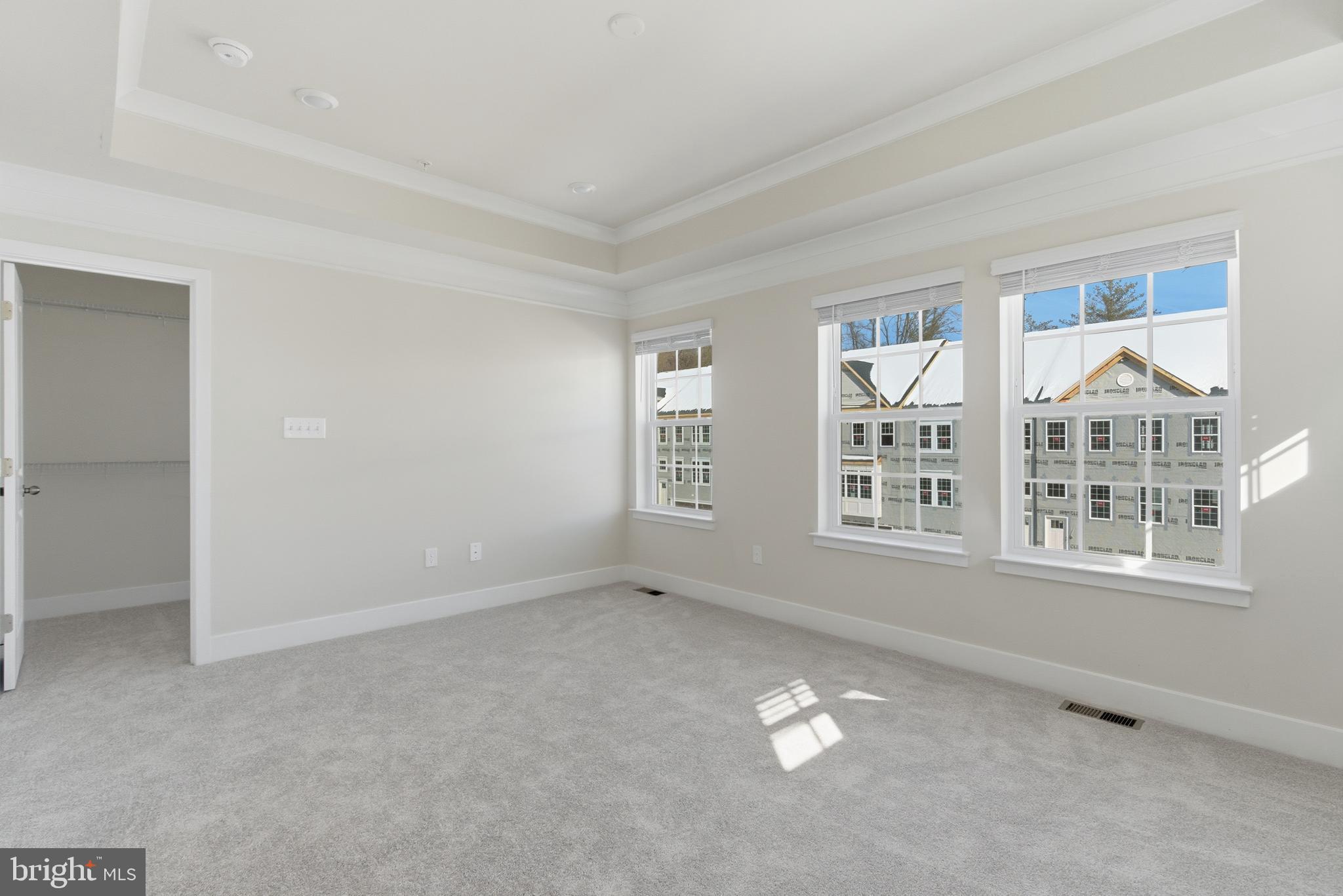 1722 Water Xing Road Baltimore, MD 21208 - Photo 20 of 41 an empty room with windows