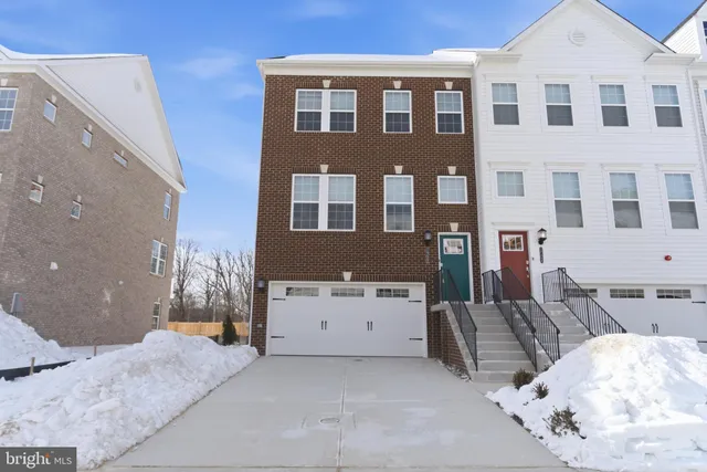 a view of a brick building with many windows