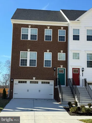 a front view of a house with yard