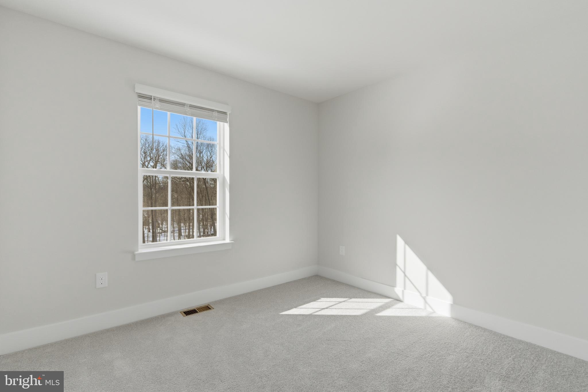 1722 Water Xing Road Baltimore, MD 21208 - Photo 25 of 41 an empty room with a window