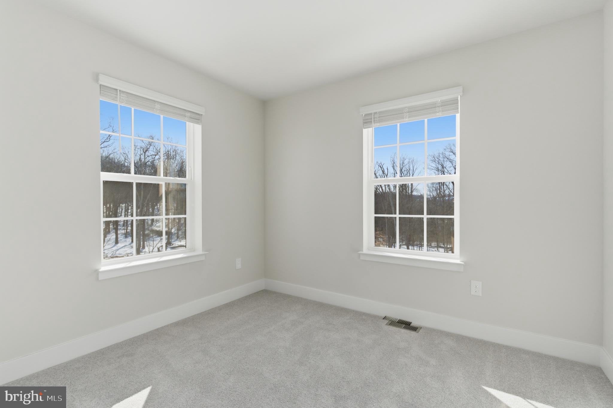 1722 Water Xing Road Baltimore, MD 21208 - Photo 28 of 41 an empty room with a window