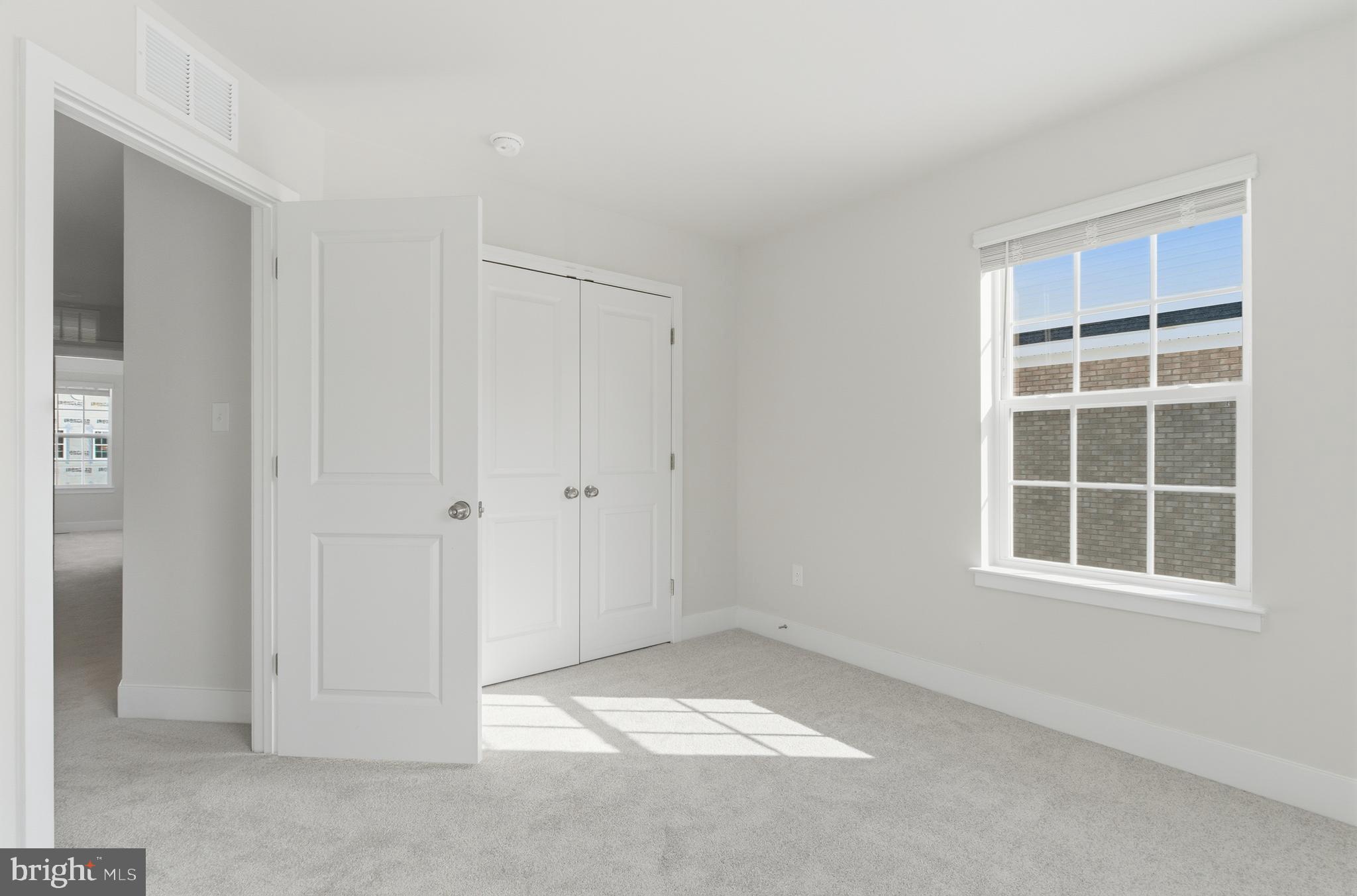1722 Water Xing Road Baltimore, MD 21208 - Photo 29 of 41 a view of empty room with windows
