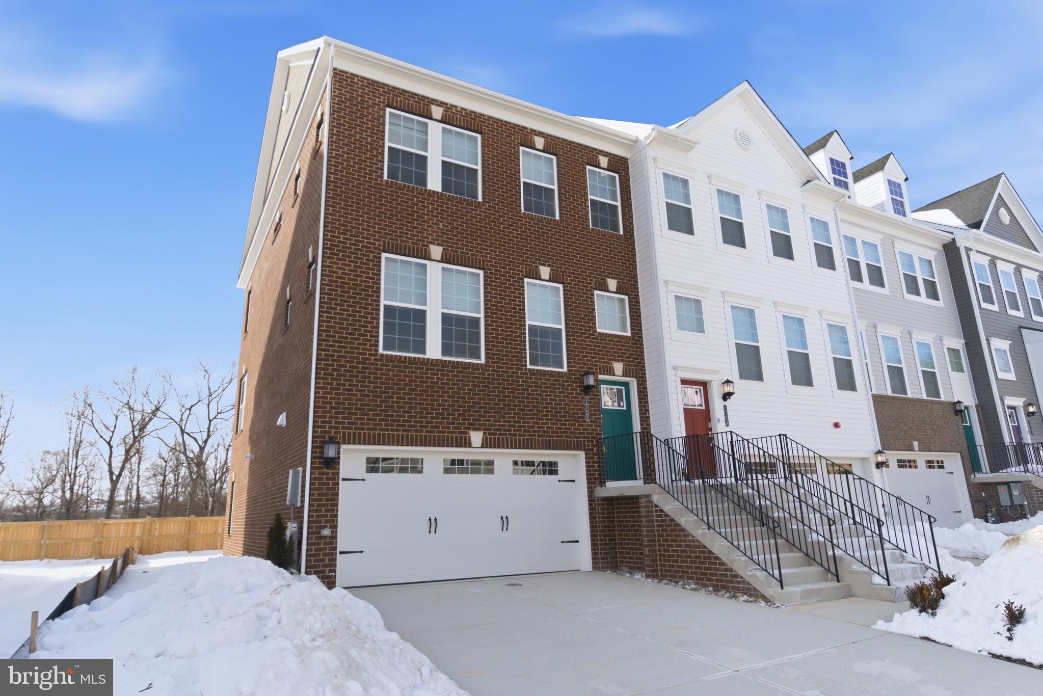 1722 Water Xing Road Baltimore, MD 21208 - Photo 3 of 41 a view of a building with a snow in the background