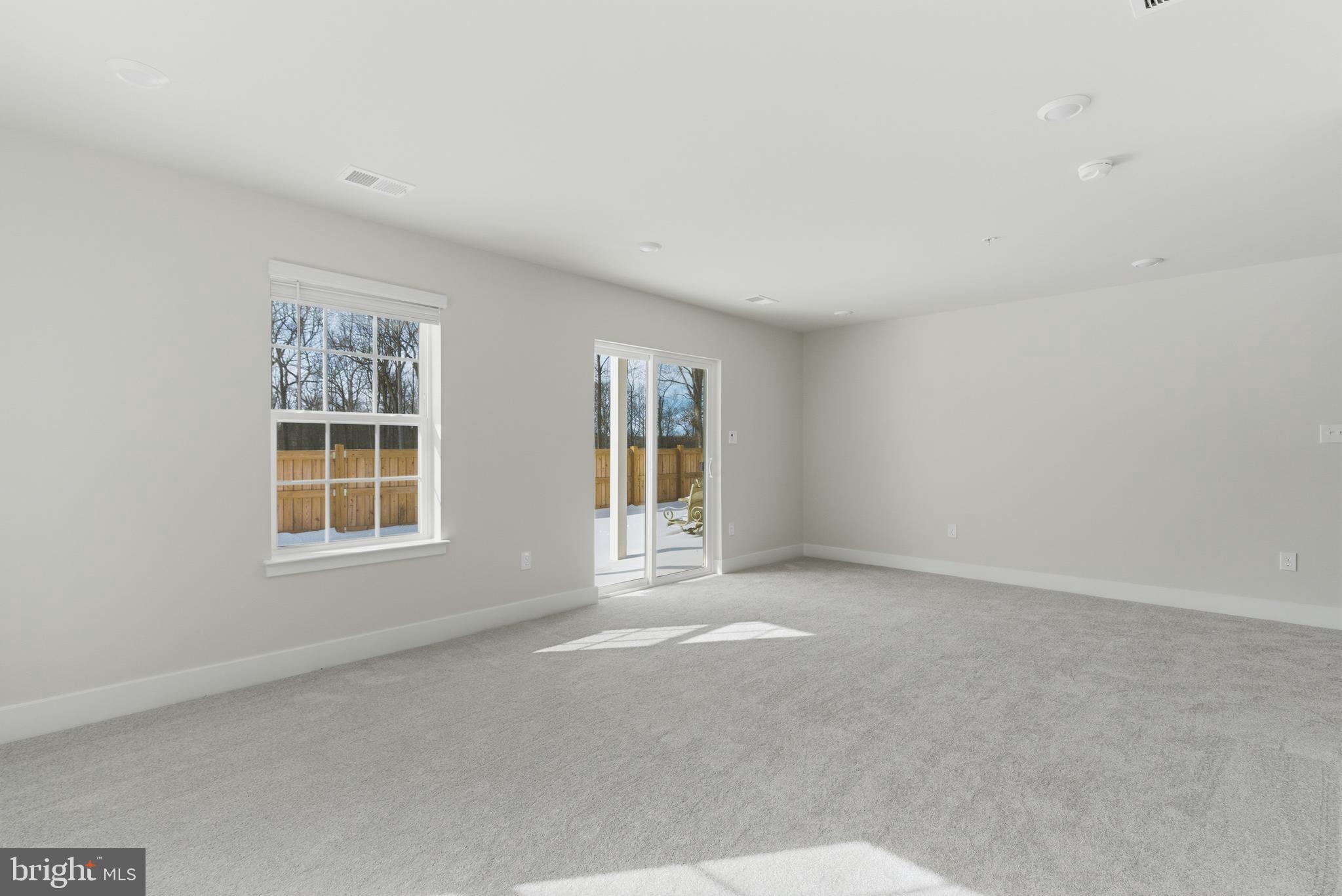 1722 Water Xing Road Baltimore, MD 21208 - Photo 31 of 41 an empty room with windows