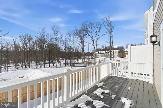 a view of a balcony with wooden floor