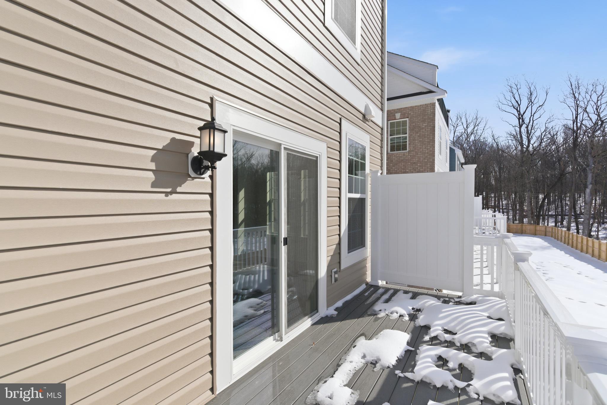 1722 Water Xing Road Baltimore, MD 21208 - Photo 38 of 41 a view of a house with a door and wooden walls