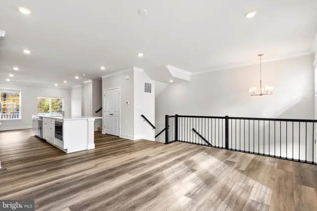 a view of a kitchen with furniture and a window