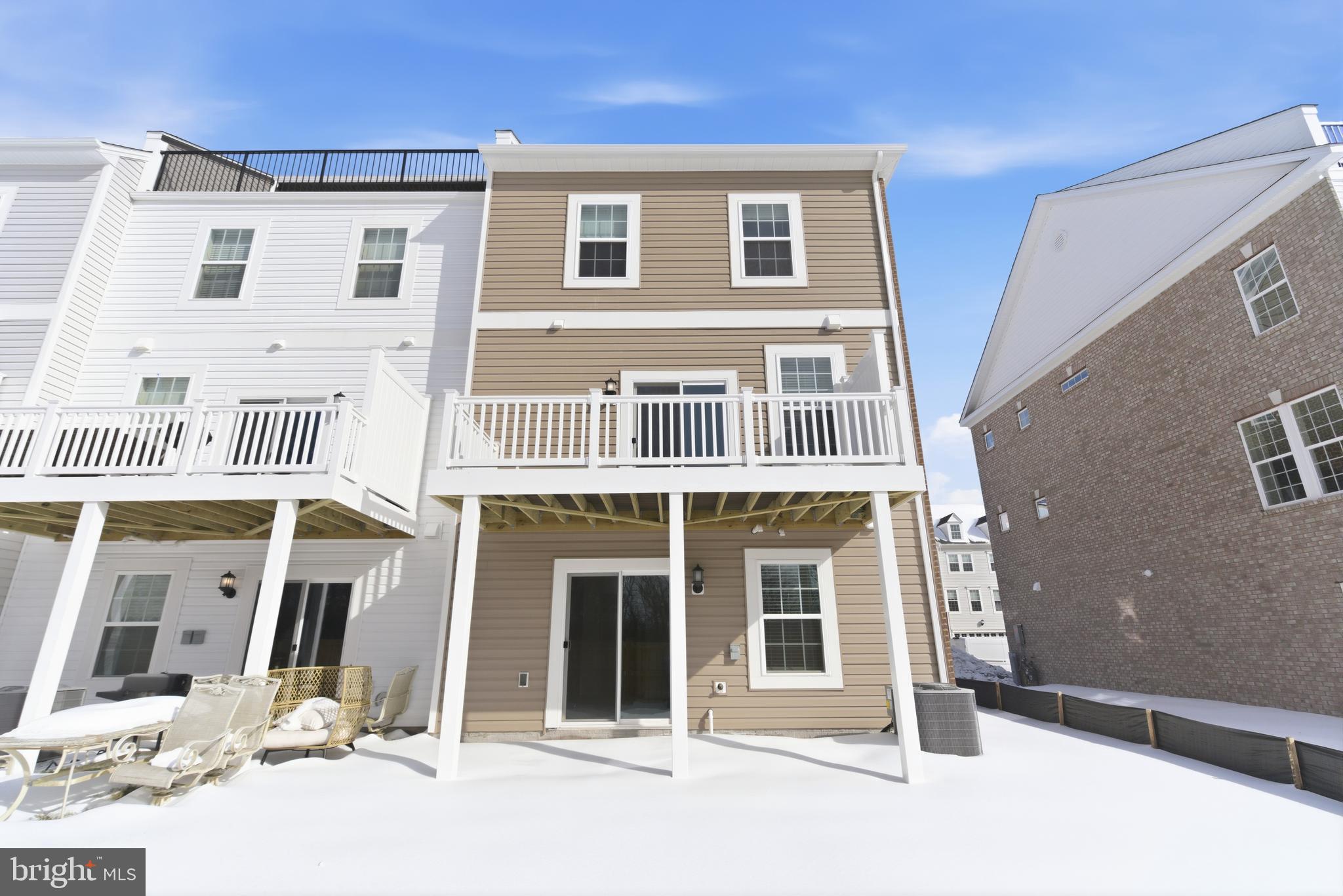 1722 Water Xing Road Baltimore, MD 21208 - Photo 41 of 41 a front view of a building with a outdoor space