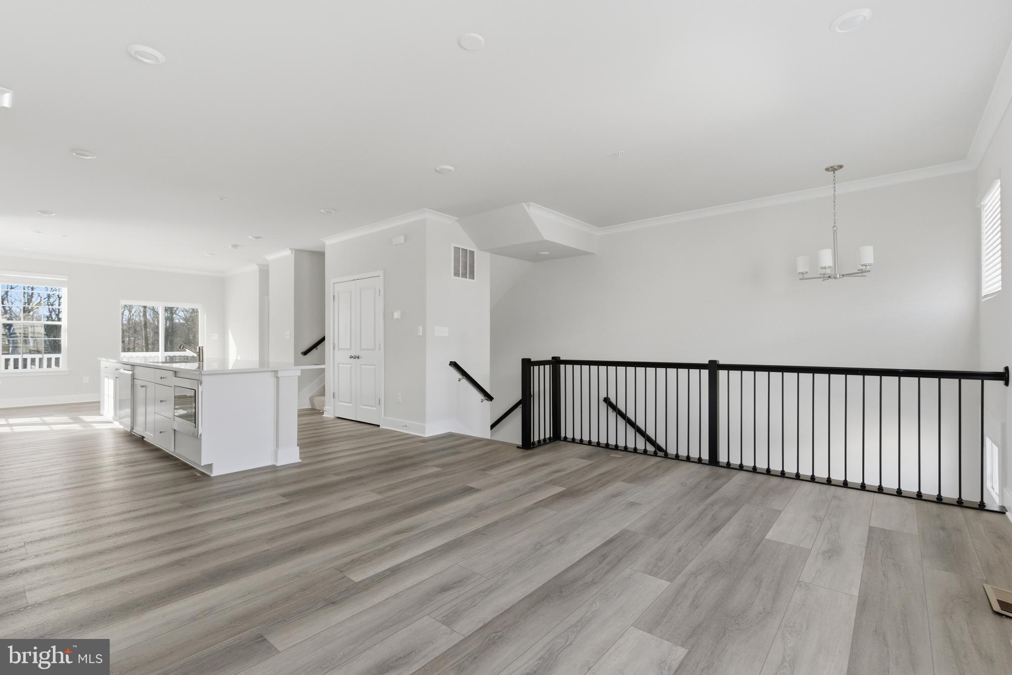 1722 Water Xing Road Baltimore, MD 21208 - Photo 6 of 41 a view of a livingroom with wooden floor