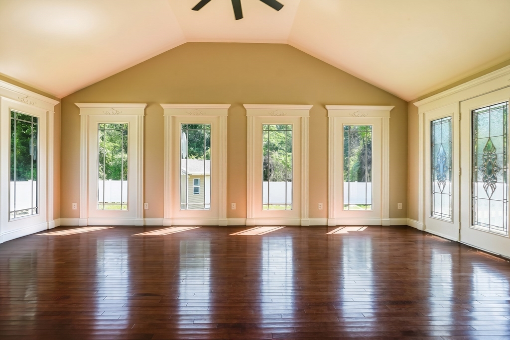 41 Watuppa Road Westport, MA 02790 - Photo 21 of 42 a view of an empty room with wooden floor and a window