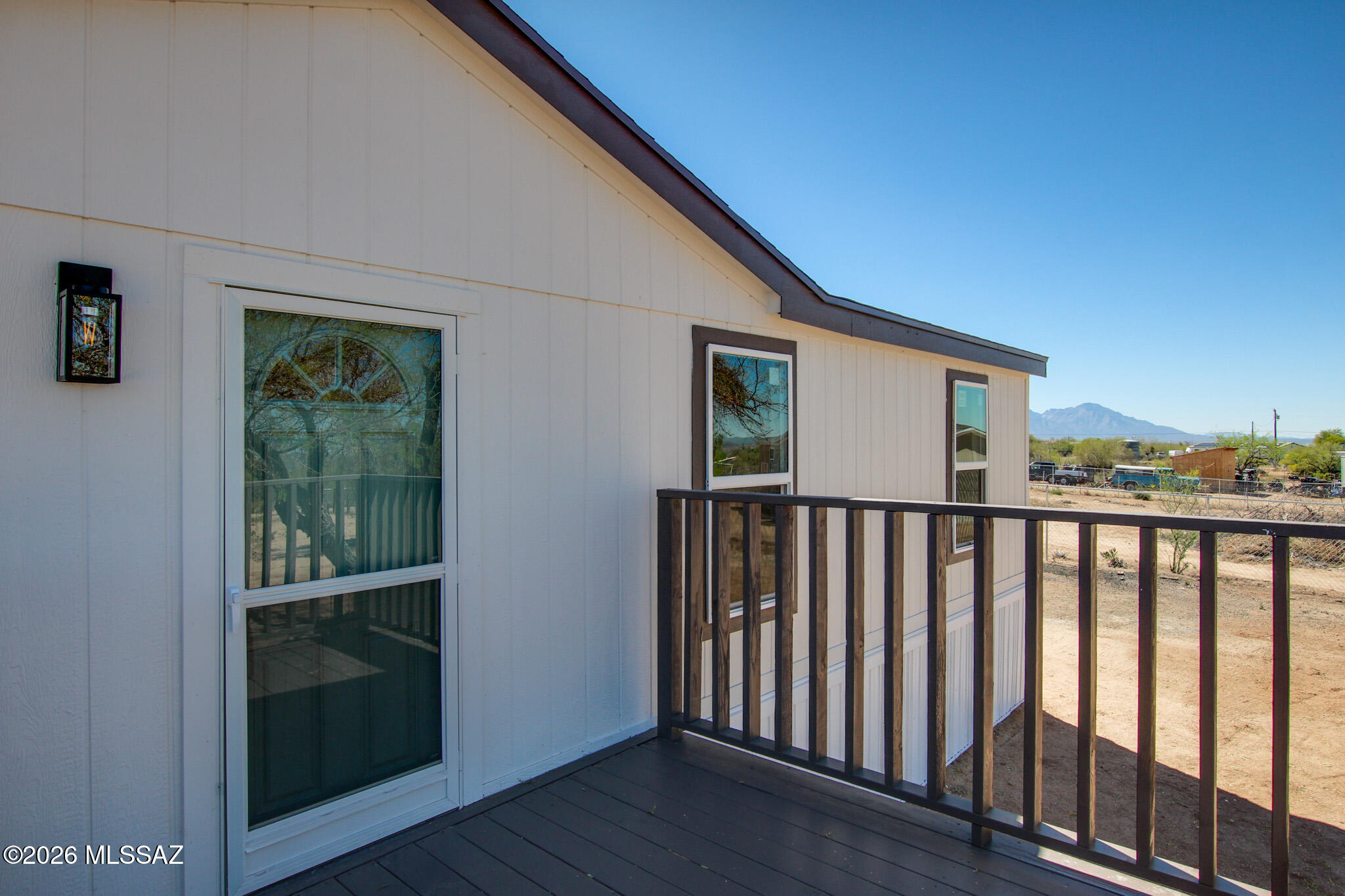 14303 West Rolina Lane Tucson, AZ 85736 - Photo 38 of 38 a view of a porch with wooden floor and outdoor space