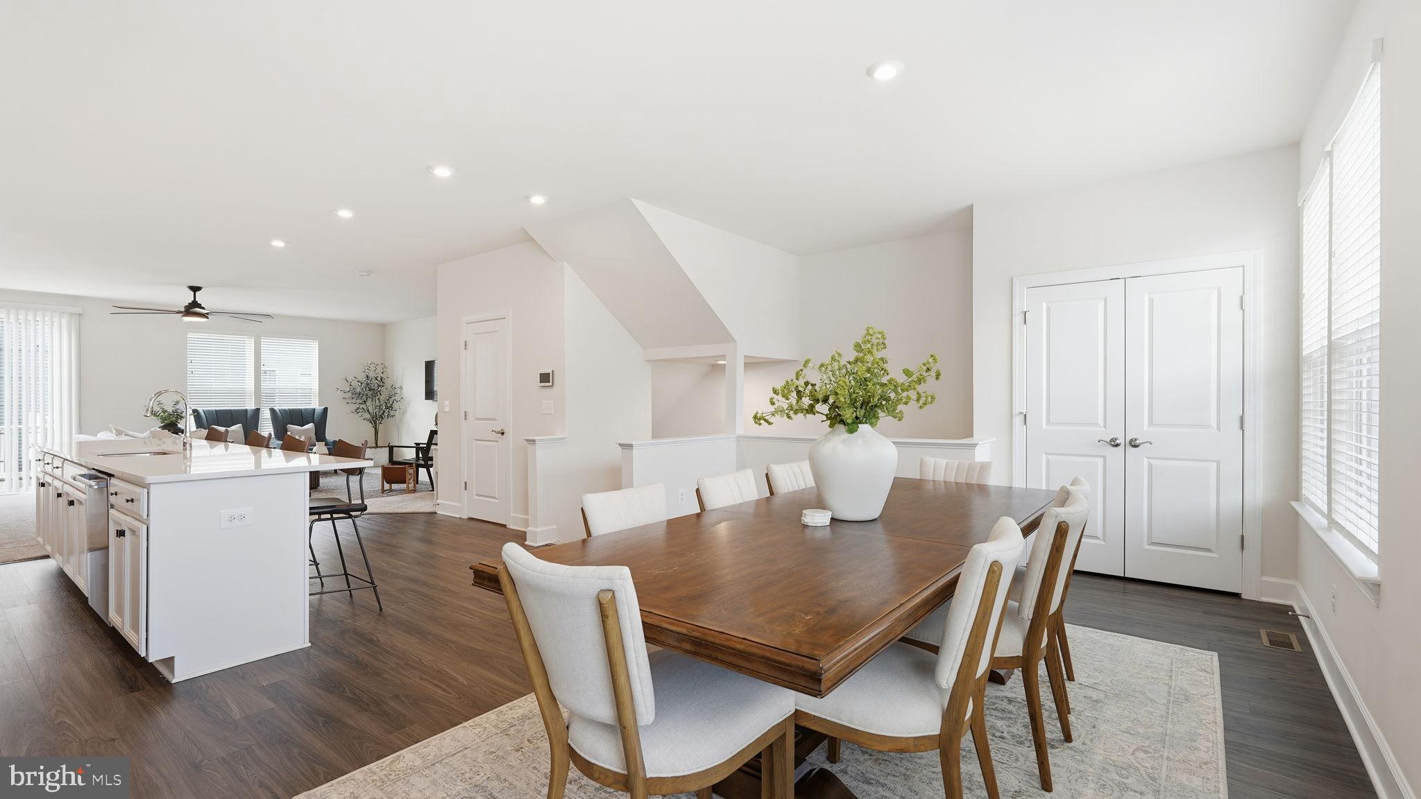 10644 Hinton Way Manassas, VA 20112 - Photo 16 of 44 a view of a dining room with furniture and wooden floor