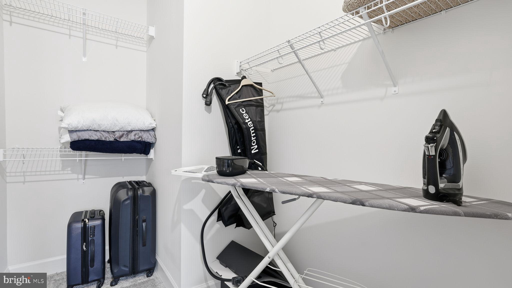 10644 Hinton Way Manassas, VA 20112 - Photo 22 of 44 a view of storage and utility room with two washing machine