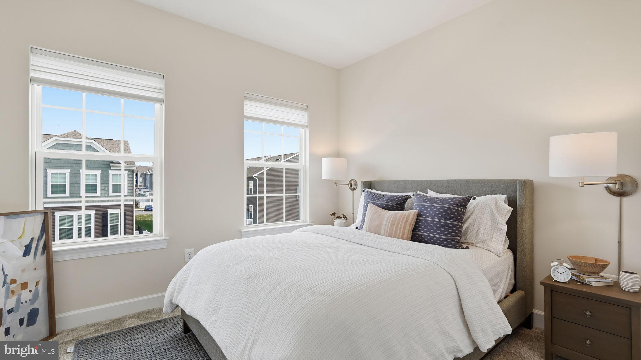 10644 Hinton Way Manassas, VA 20112 - Photo 26 of 44 a bedroom with a large bed and a window