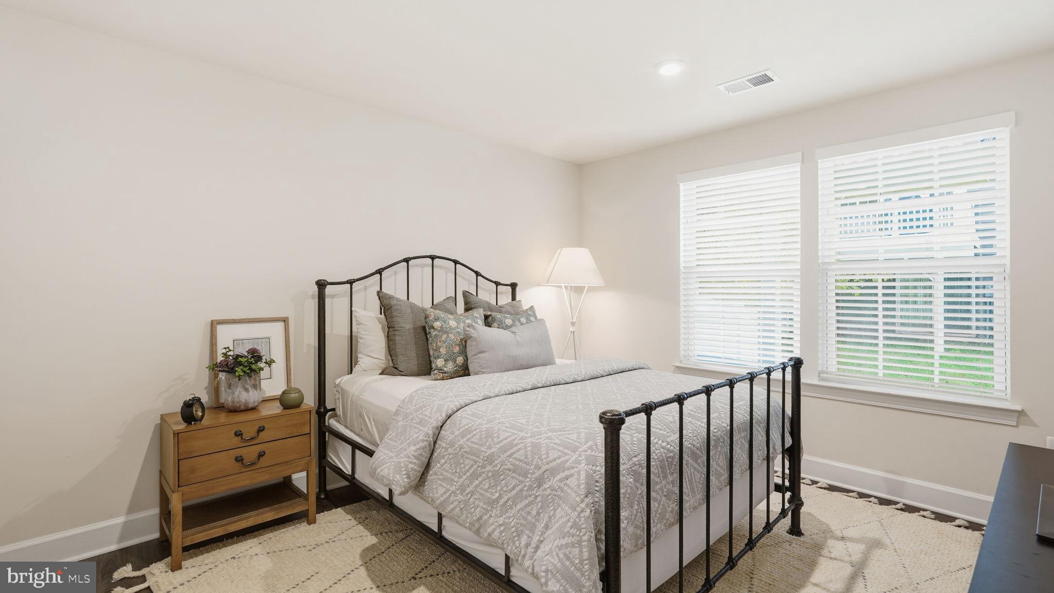 10644 Hinton Way Manassas, VA 20112 - Photo 31 of 44 a bedroom with a bed and a window