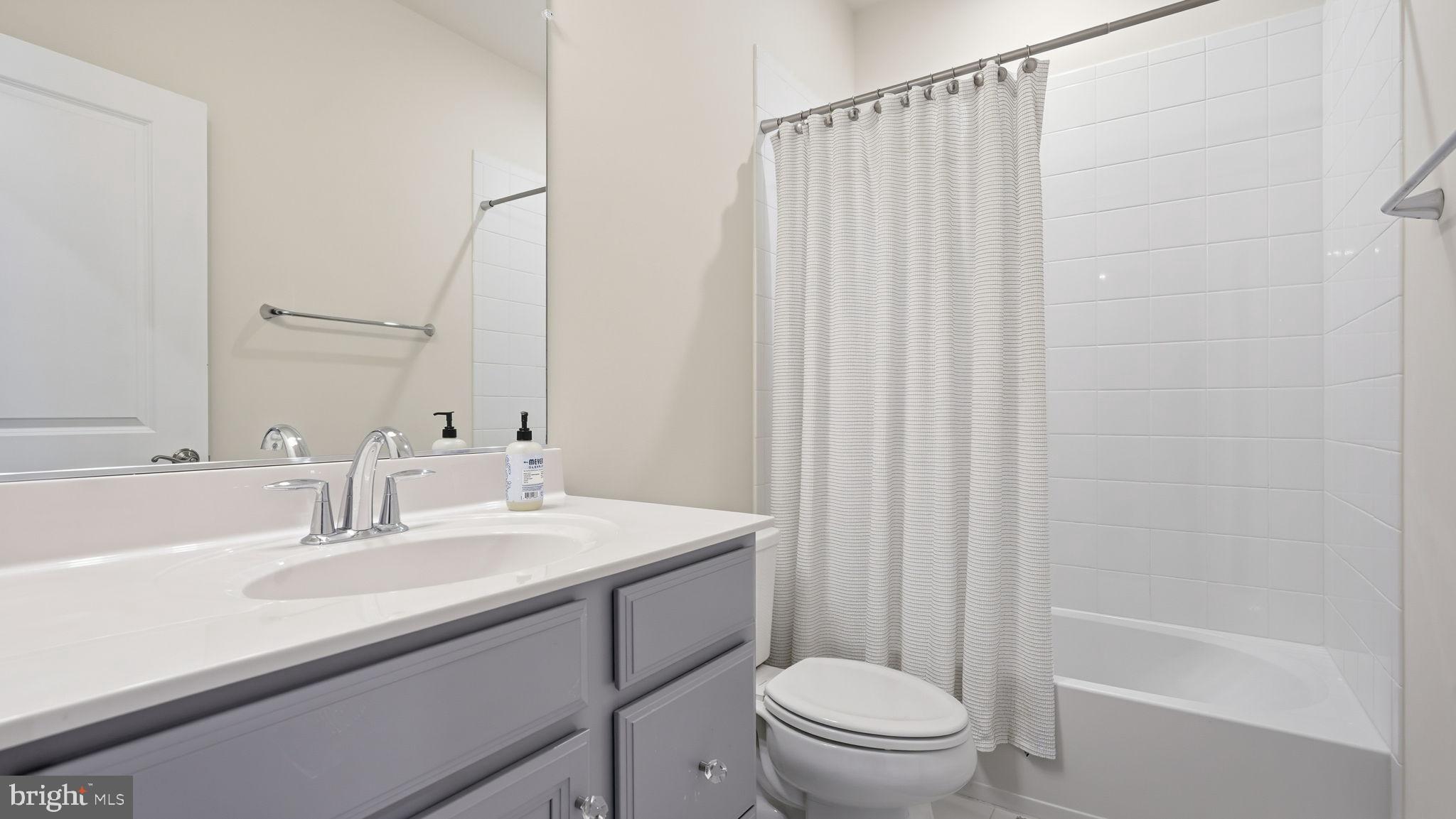 10644 Hinton Way Manassas, VA 20112 - Photo 34 of 44 a bathroom with a sink a toilet and shower