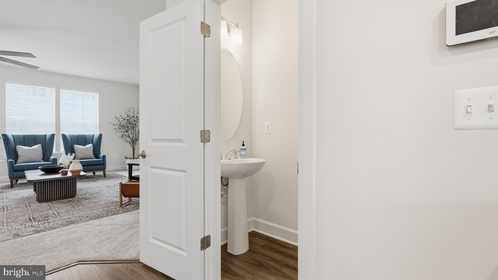 10644 Hinton Way Manassas, VA 20112 - Photo 7 of 44 a view of a kitchen with refrigerator stove and sink