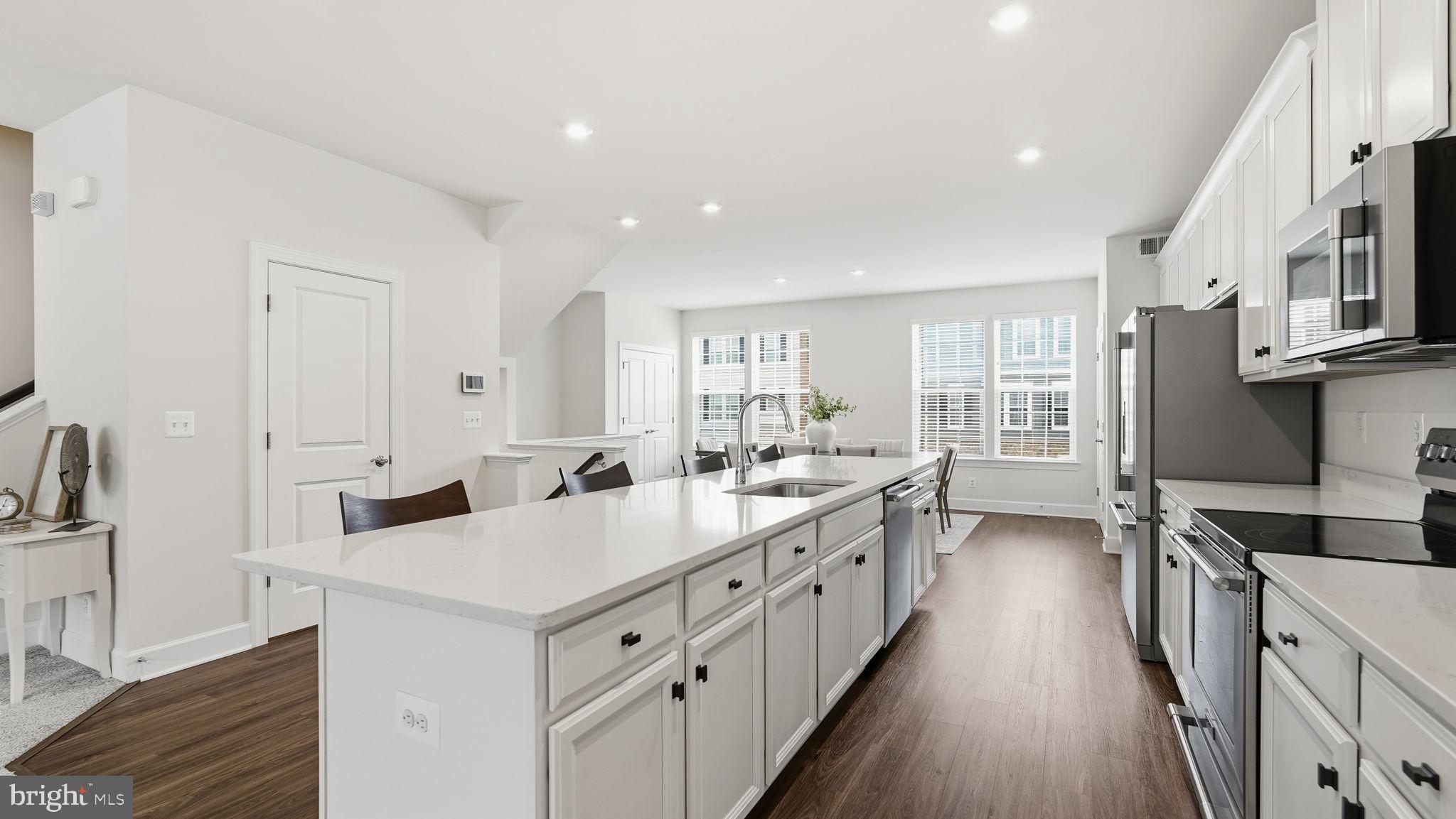 10644 Hinton Way Manassas, VA 20112 - Photo 10 of 44 a kitchen with counter top space sink and center